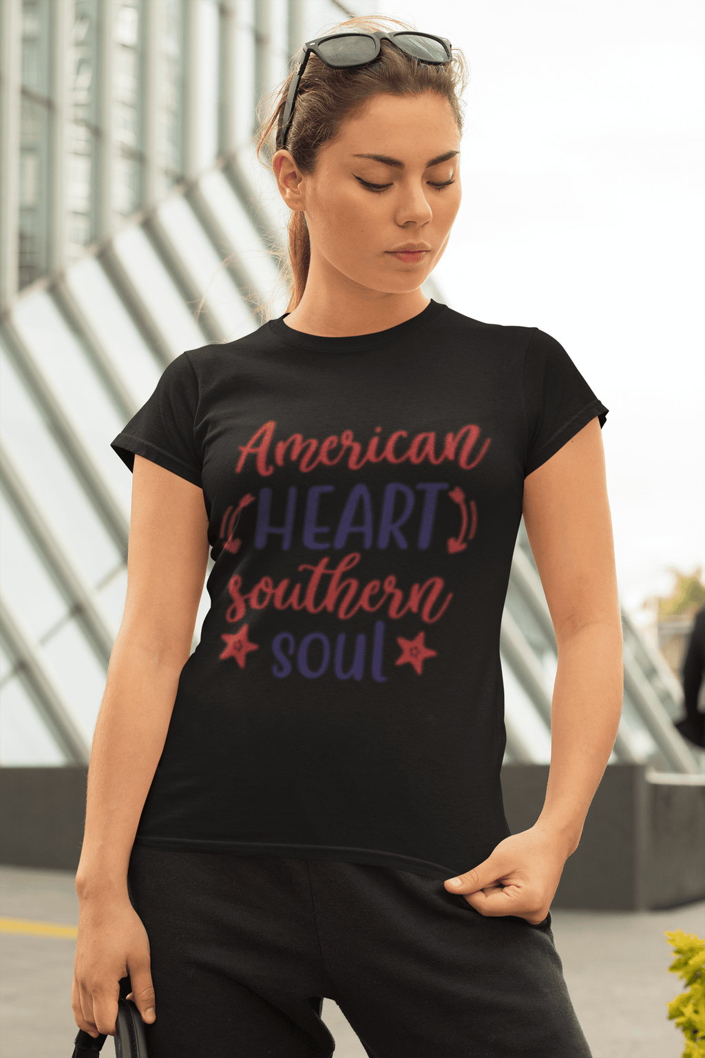 Southern Heritage graphic t-shirt worn by athleisure woman sunglasses