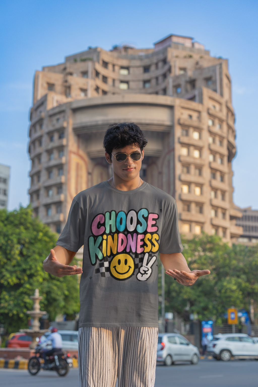 Choose Kindness positive message graphic t-shirt worn by man blinkstore sunglasses street