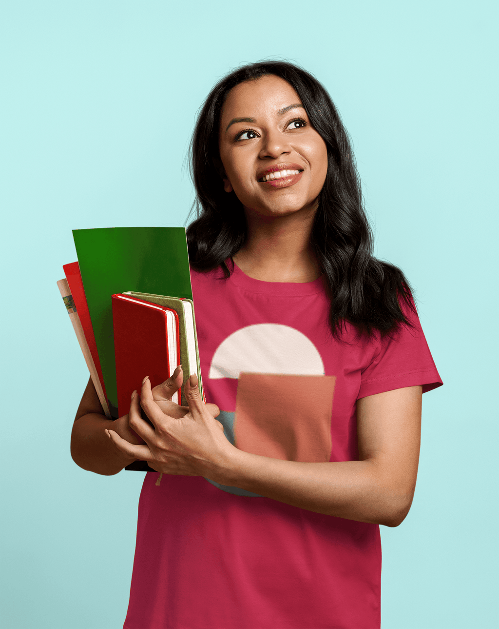 Geometric graphic t-shirt worn by smiling teacher holding books