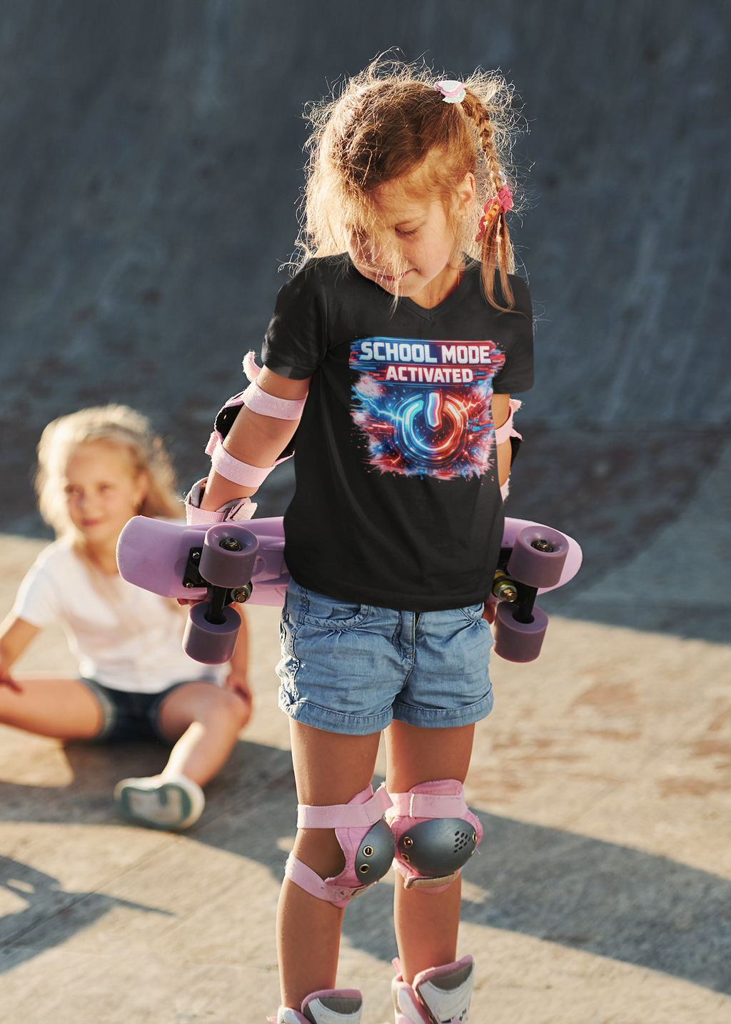 School Mode Activated Kids funny back to school kids graphic t-shirt worn by young girl skating park