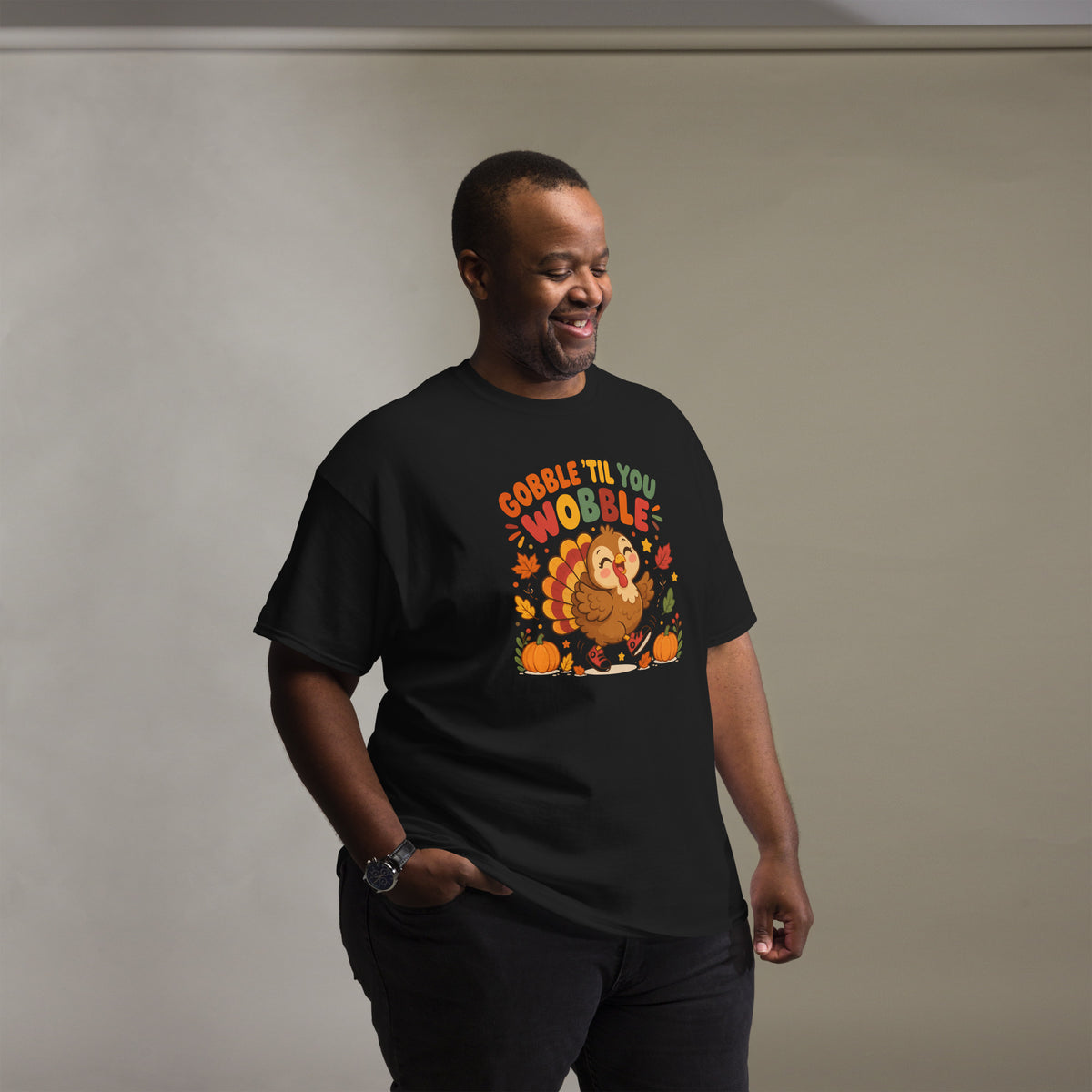 Gobble Til You Wobble Thanksgiving tee with a dancing cartoon turkey and pumpkins — alternate view