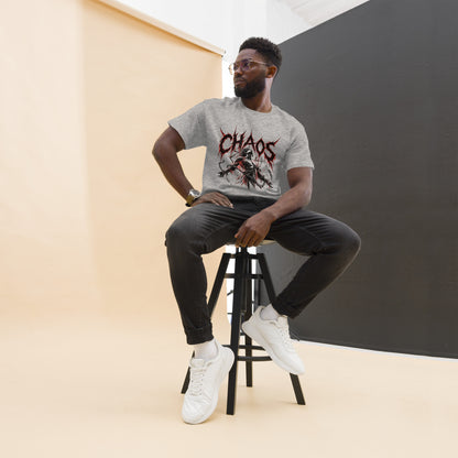 Man in Chaos graphic tee — hooded figure breaking out of a smoke cloud beneath jagged red CHAOS lettering, worn on sport grey unisex tee
