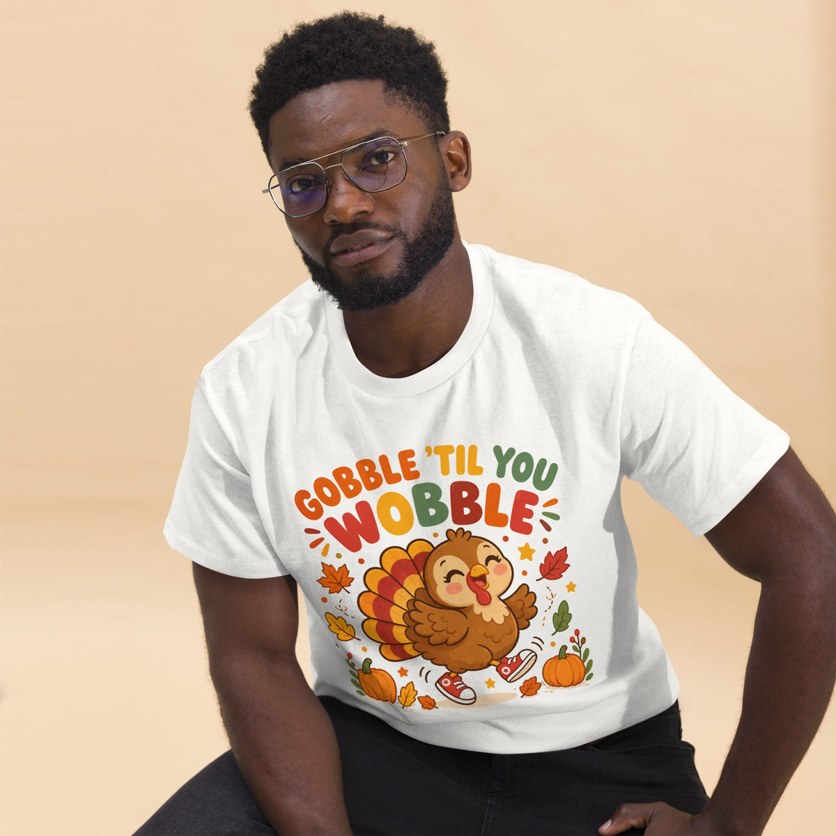 Gobble Til You Wobble Thanksgiving tee with a dancing cartoon turkey and pumpkins — alternate view