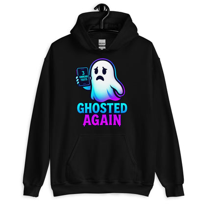 A black pullover hoodie with a graphic of a sad, glowing blue and purple ghost holding a phone that says '3 MORE TESTS' above the text 'GHOSTED AGAIN' in blue and pink, shown on a hanger against a white background.