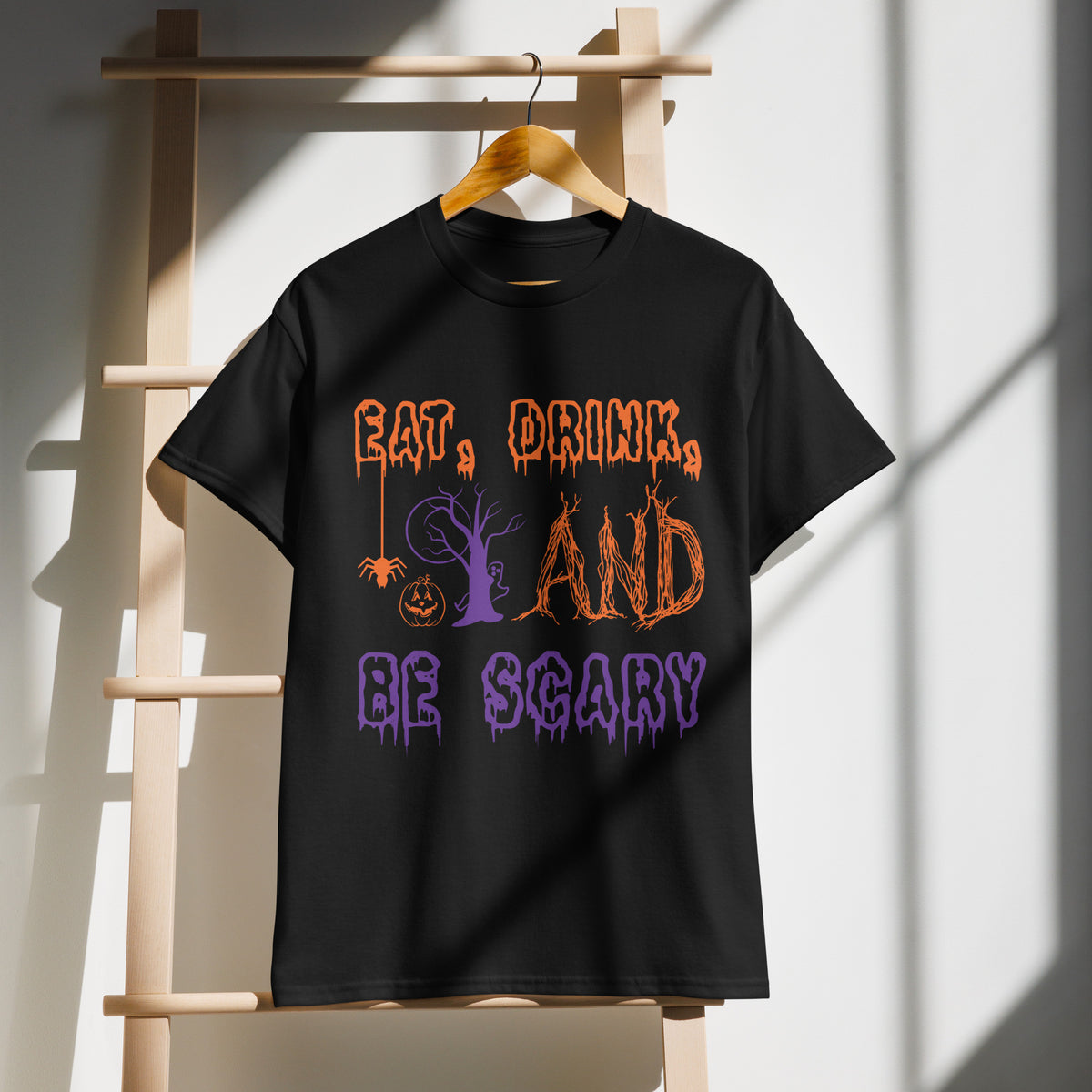 Eat, Drink, And Be Scary Graphic Tee in black — front view